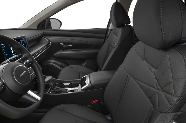 Interior of a 2026 Hyundai Tucson showing two black fabric seats, dashboard, and console.